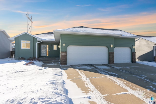 ranch-style home with a garage