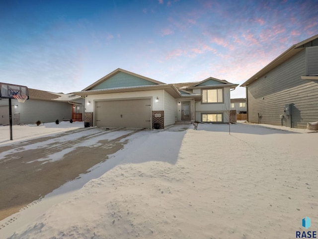 view of front of property featuring a garage