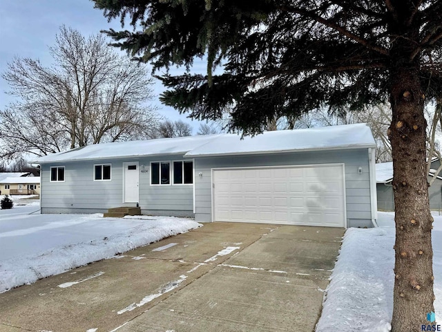 ranch-style home with a garage