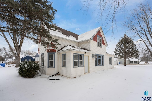 view of snow covered property