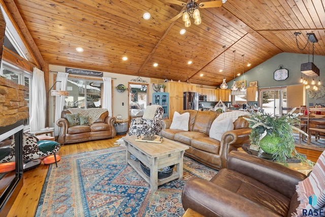 living room with wood ceiling, high vaulted ceiling, ceiling fan, and light hardwood / wood-style flooring