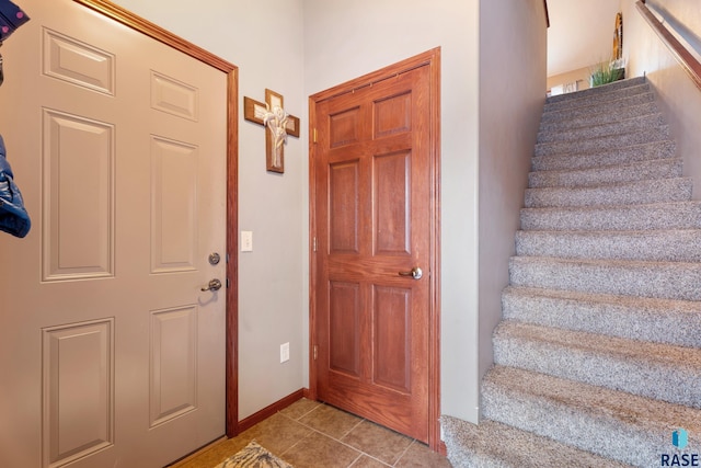 view of tiled foyer entrance