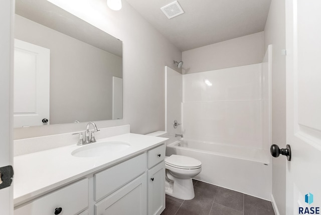 full bathroom featuring vanity,  shower combination, toilet, and tile patterned floors