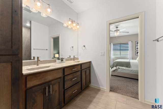 bathroom with vanity and ceiling fan