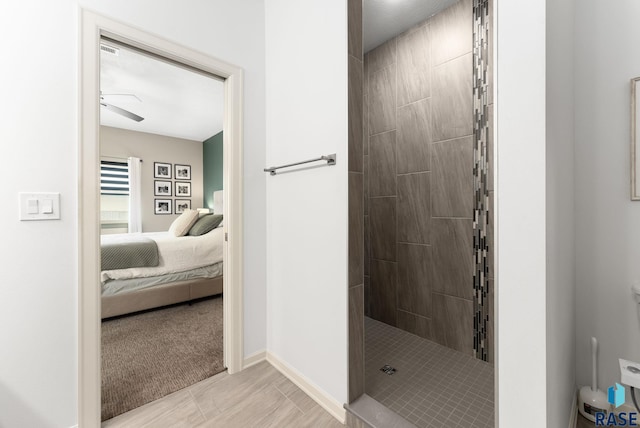 bathroom featuring tiled shower