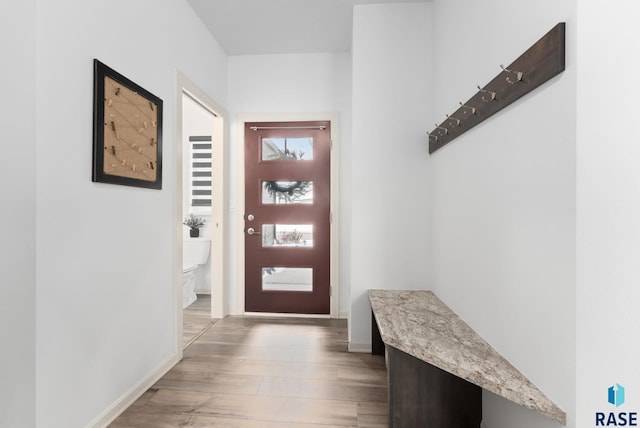 doorway to outside with hardwood / wood-style flooring