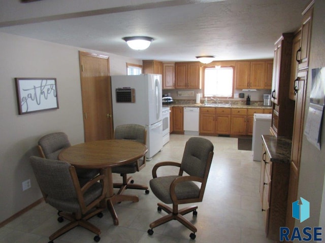 dining room with baseboards