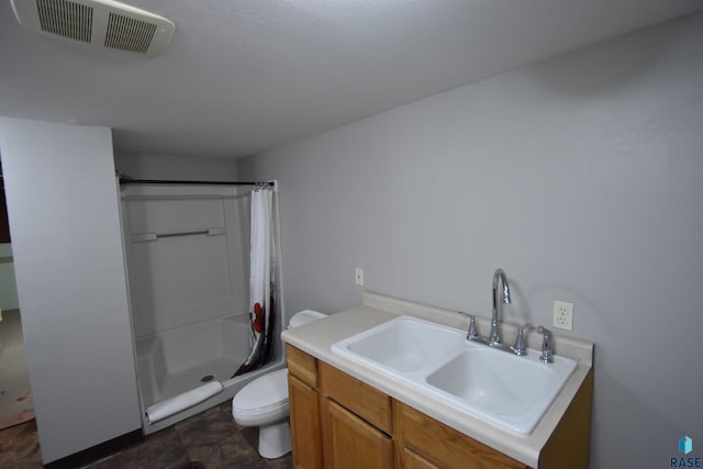 full bathroom featuring a stall shower, visible vents, vanity, and toilet