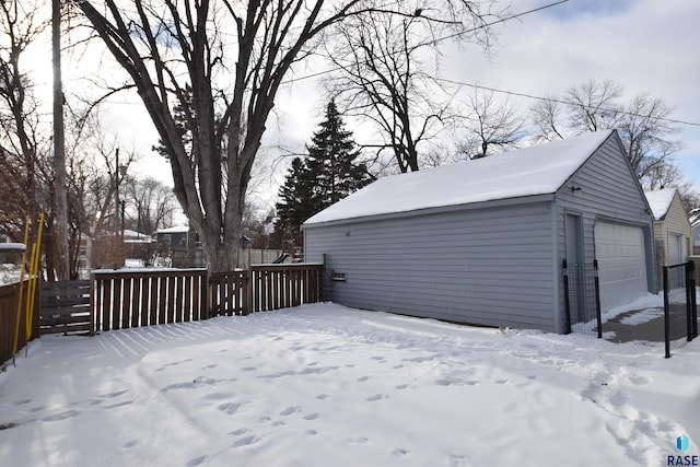 exterior space with a detached garage