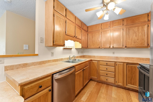 kitchen with electric range, light countertops, light wood-type flooring, stainless steel dishwasher, and a sink