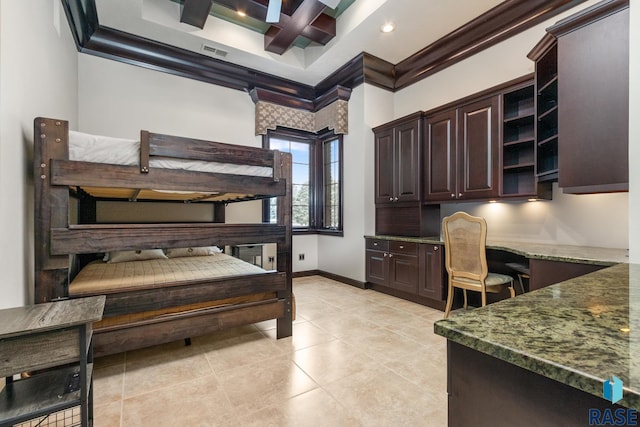 bedroom with built in desk, visible vents, ornamental molding, coffered ceiling, and baseboards