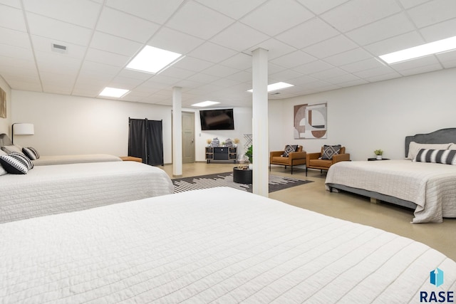 bedroom featuring a drop ceiling