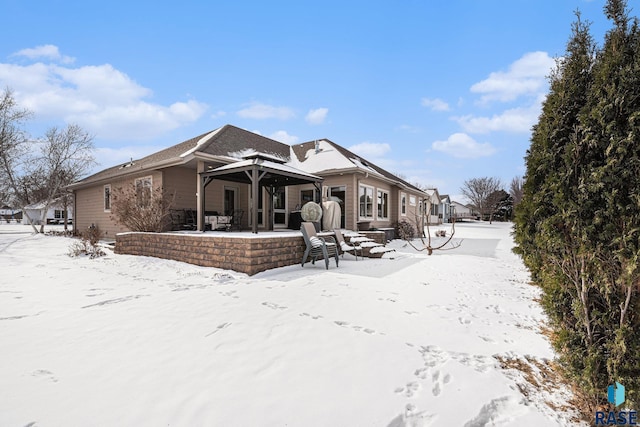 view of snow covered property