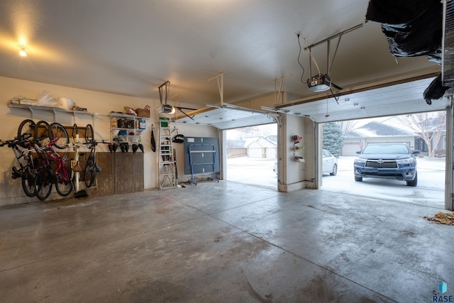 garage featuring a garage door opener