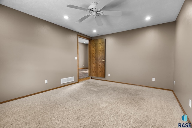 unfurnished room featuring recessed lighting, carpet flooring, a ceiling fan, visible vents, and baseboards