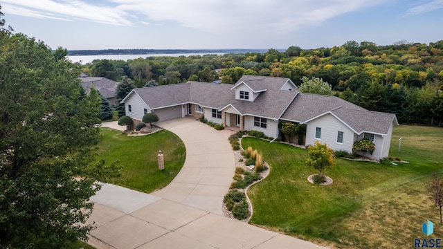 birds eye view of property featuring a water view