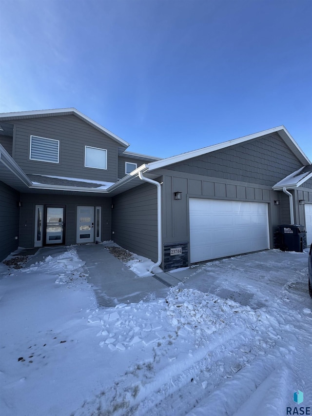 view of front of property featuring a garage and board and batten siding