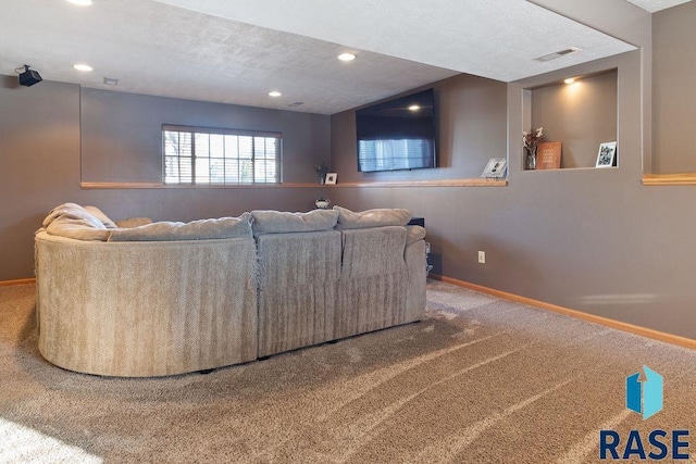 carpeted living room featuring recessed lighting, visible vents, and baseboards