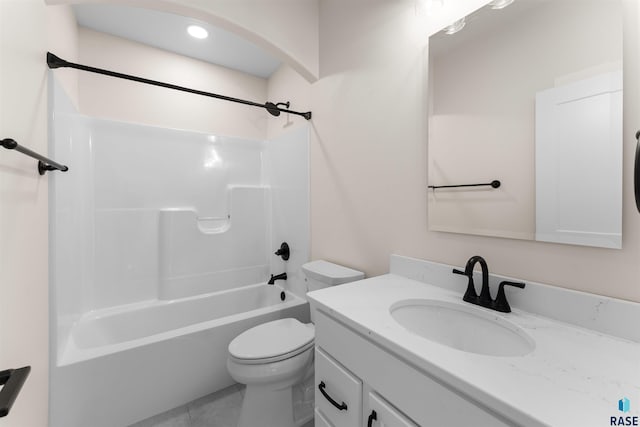 bathroom with  shower combination, toilet, and vanity