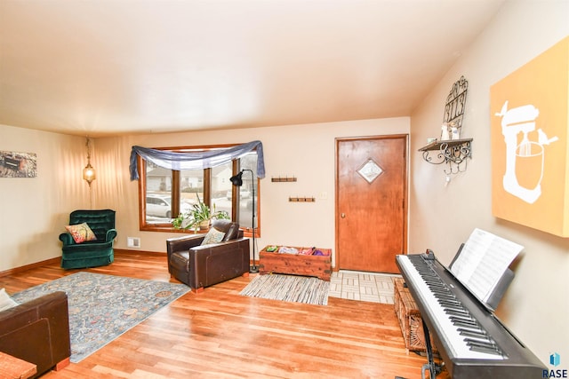 foyer entrance featuring wood finished floors