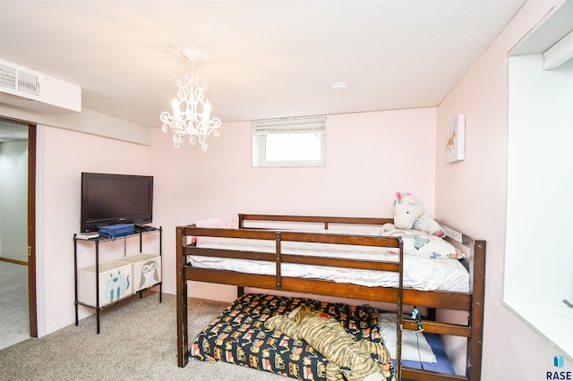 carpeted bedroom with an inviting chandelier and visible vents