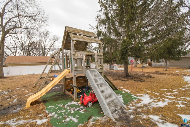 view of play area featuring fence