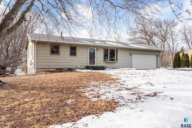 single story home with a garage