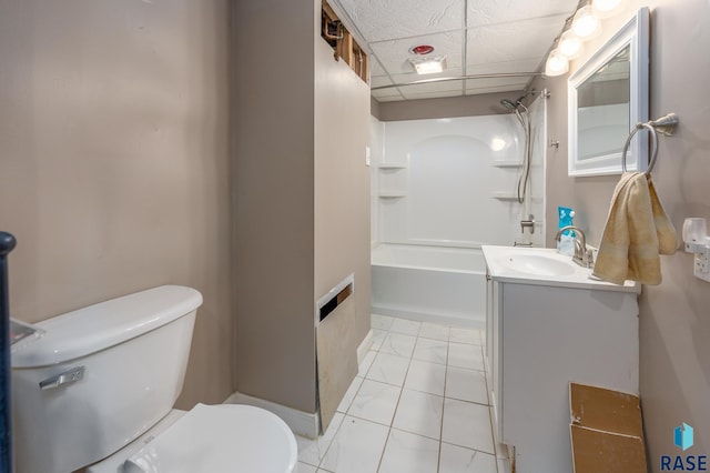 full bath featuring shower / bath combination, toilet, marble finish floor, vanity, and a paneled ceiling