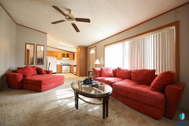 living area with vaulted ceiling, a textured ceiling, light carpet, and crown molding