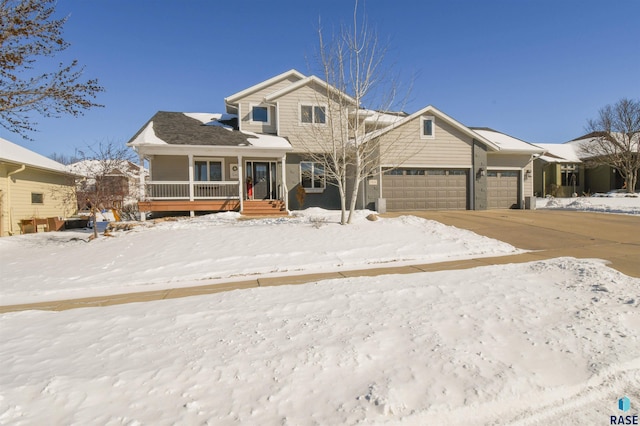 view of front of house with a porch and an attached garage