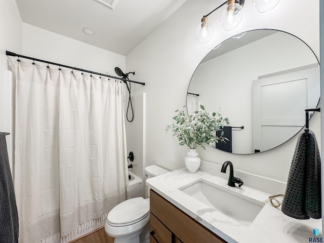 full bath with shower / bath combination with curtain, vanity, and toilet