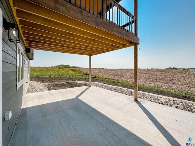 view of patio / terrace featuring a rural view