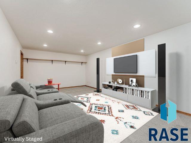 living room featuring recessed lighting, baseboards, and light colored carpet