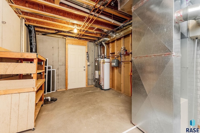 unfinished basement featuring water heater and heating unit