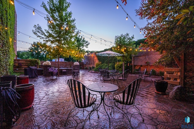 view of patio / terrace featuring fence