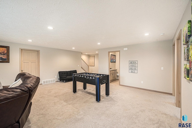 playroom featuring light carpet, baseboards, visible vents, and recessed lighting