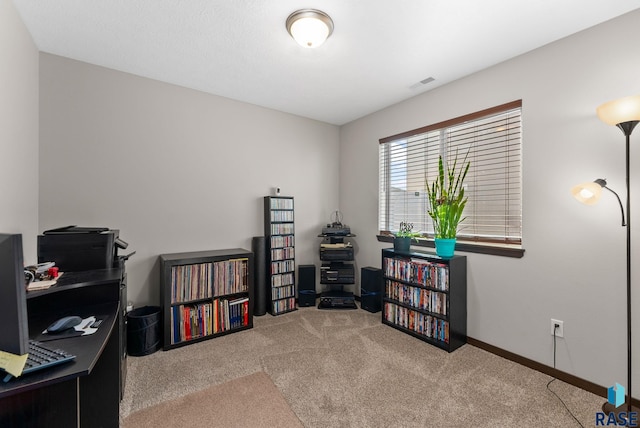 miscellaneous room featuring carpet flooring, visible vents, and baseboards