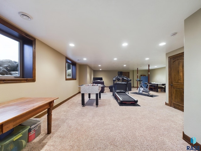 playroom featuring baseboards, recessed lighting, and light colored carpet