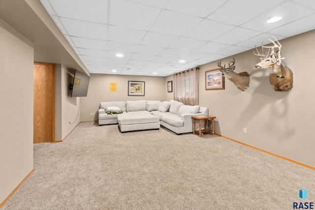 carpeted living room with recessed lighting, a paneled ceiling, and baseboards