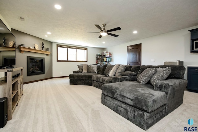 living area with recessed lighting, visible vents, baseboards, and light colored carpet