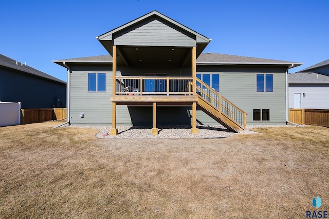 back of house featuring a deck, stairway, and fence