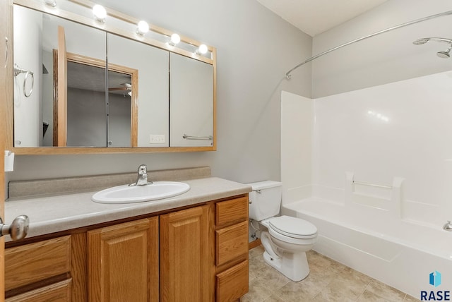 full bathroom featuring toilet, tile patterned flooring, shower / tub combination, and vanity