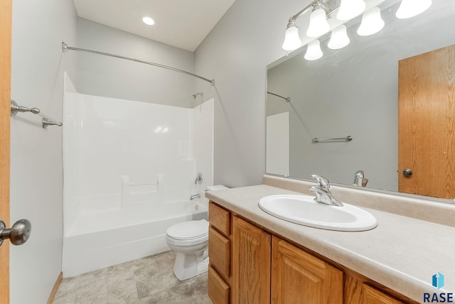 full bath with toilet, shower / tub combination, and vanity