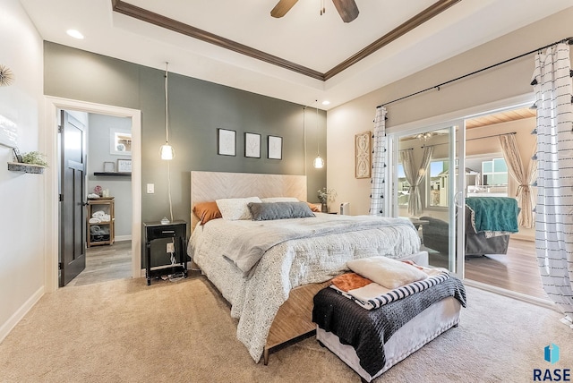 bedroom featuring crown molding, a raised ceiling, light carpet, access to outside, and baseboards