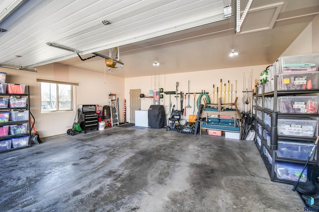 garage featuring a garage door opener