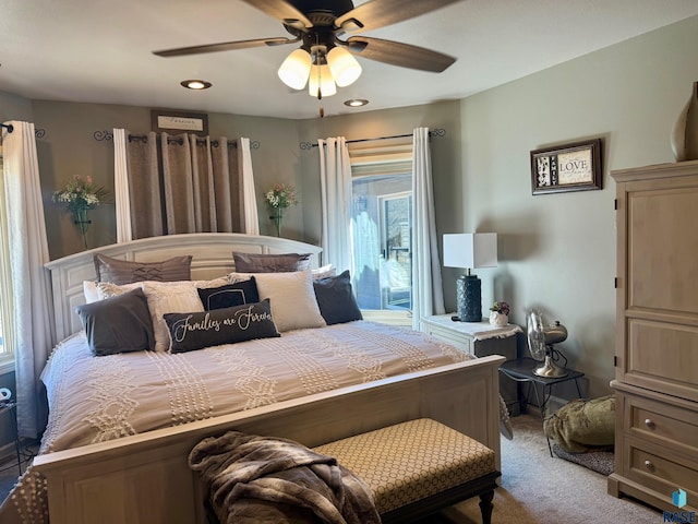 bedroom featuring ceiling fan and light colored carpet