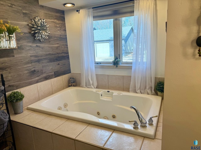 full bath featuring a jetted tub