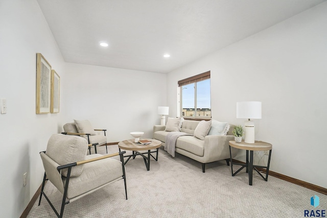 living room featuring light carpet, recessed lighting, and baseboards