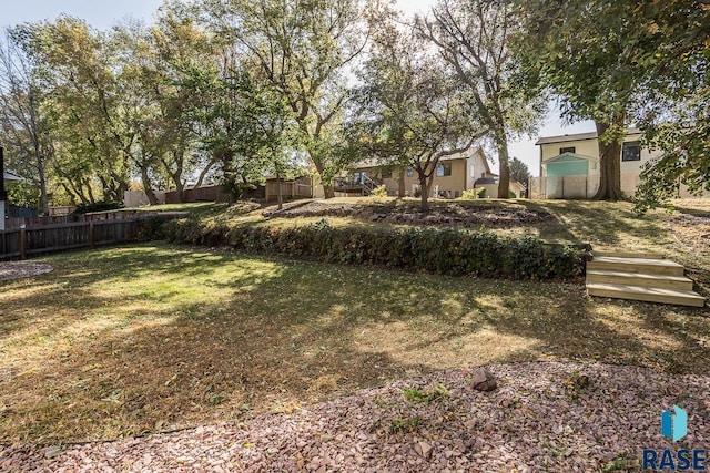 view of yard featuring fence