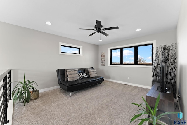 sitting room featuring carpet, baseboards, a ceiling fan, and recessed lighting